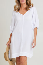 Model Grace wearing size S of the Byron Cotton Dress in colour White (White), from the front, cropped image