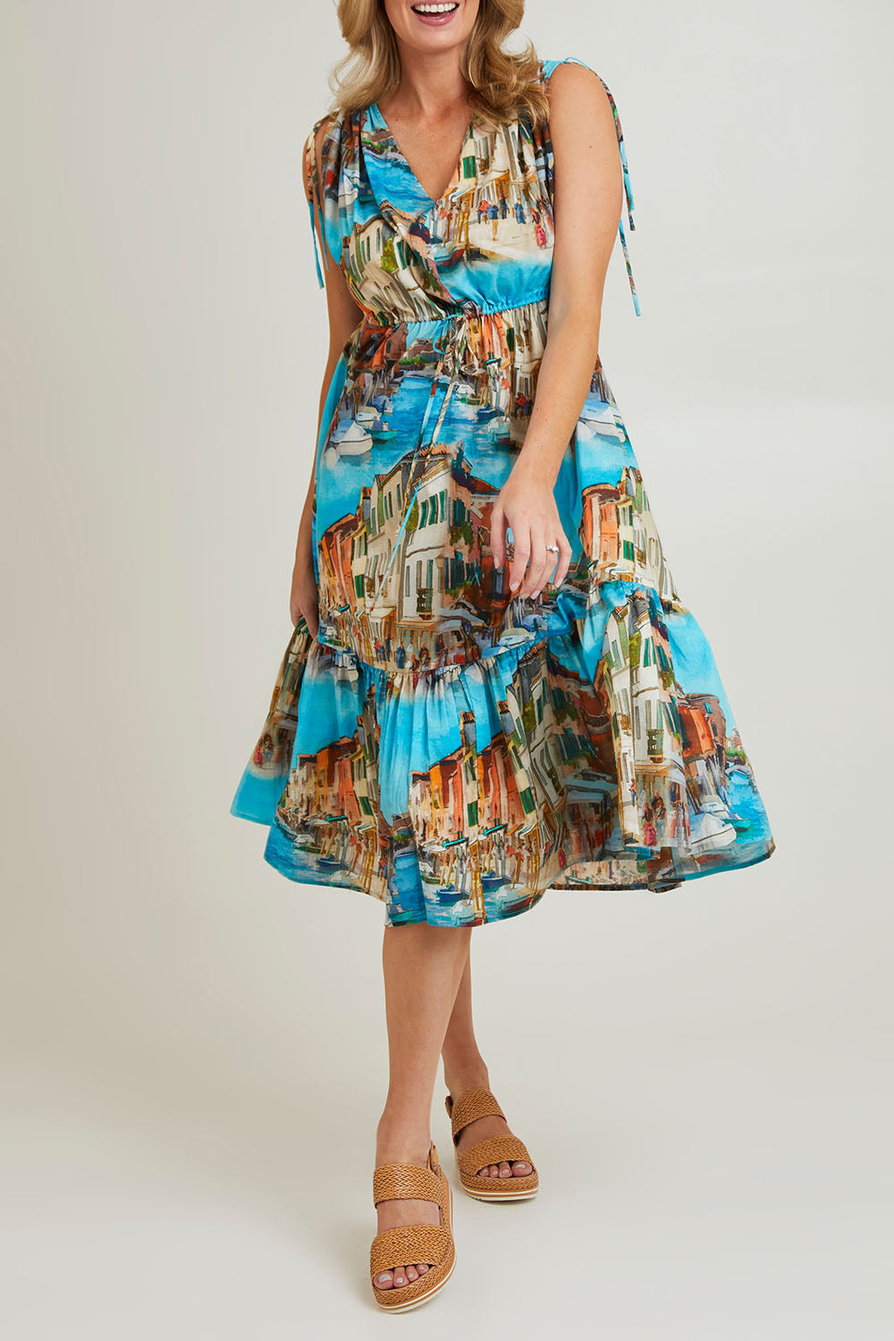 Model Grace wearing size S of the Venice Cotton Dress in colour Blue (Blue), from the front, cropped image