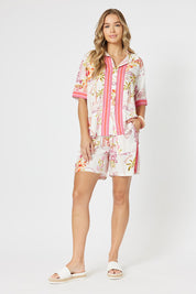 A model wearing the Ciao Bella Short in colour Pink (Pink), from the front, showing the whole outfit
