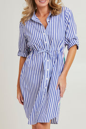 Model Grace wearing size S of the Get Shirty Cotton Stripe Dress in colour Blue (Blue), from the front, cropped image