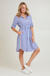 Model Grace wearing size S of the Get Shirty Cotton Stripe Dress in colour Blue (Blue), from the front, showing the whole outfit