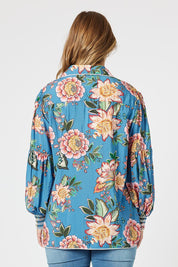 A model wearing the Vintage Rose Shirt in colour Multi (Blue), from the back