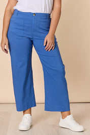 A model wearing The Marine Wide Leg Pant in colour Blue (Blue), from the front, cropped image