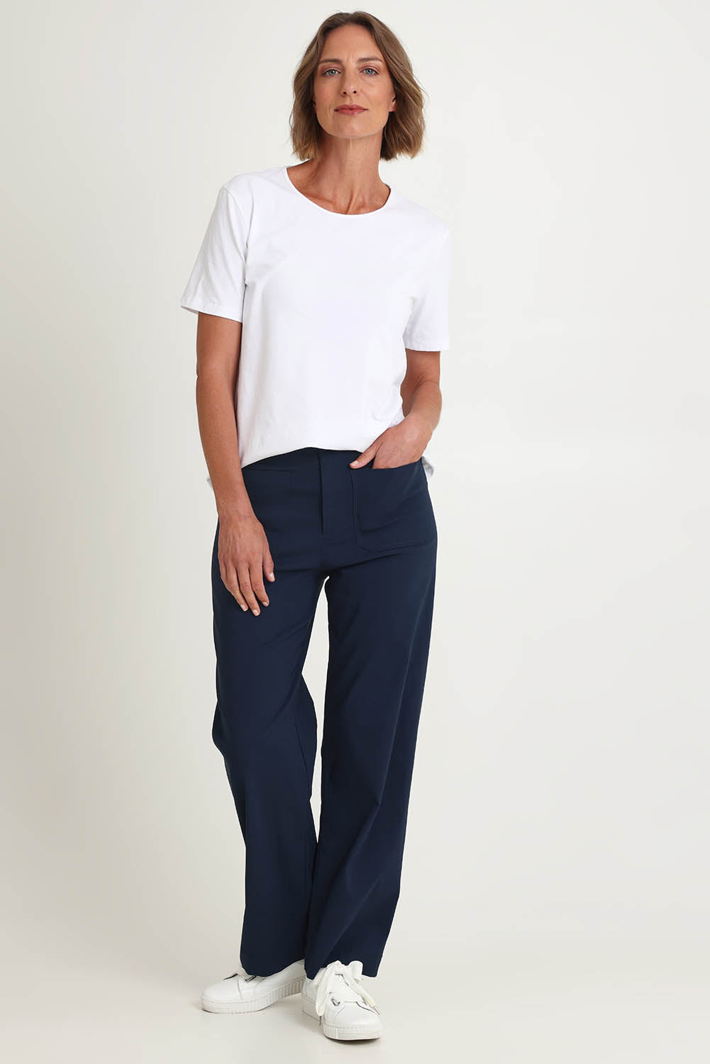 Model Riina wearing size S of The Marine Wide Leg Pant in colour Navy (Blue), from the front, showing the whole outfit