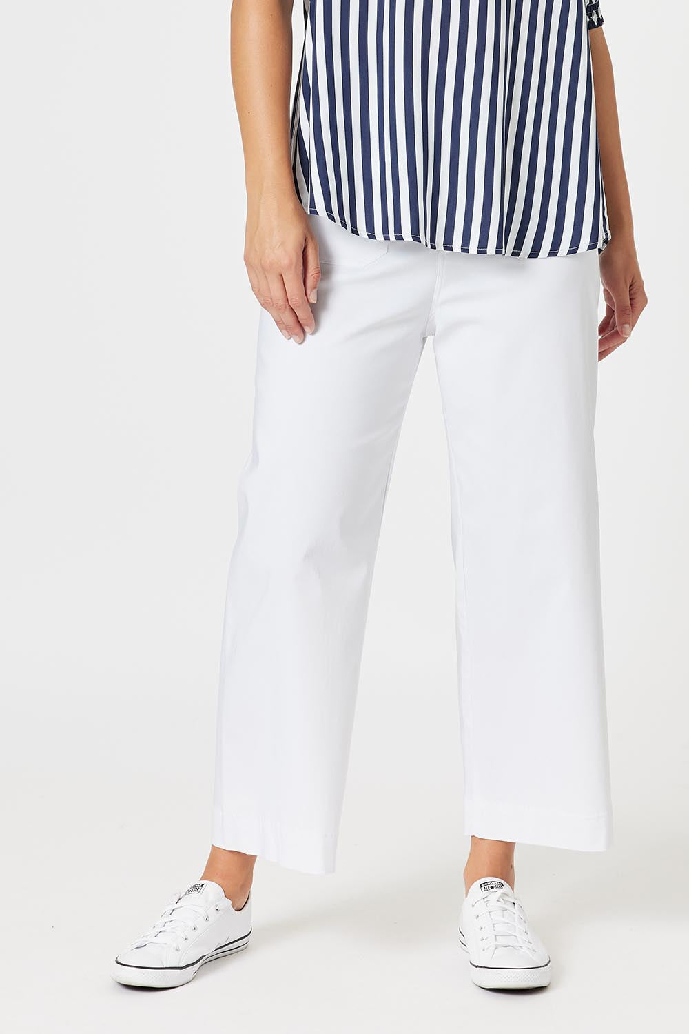 A model wearing The Marine Wide Leg Pant in colour White (White), from the front, cropped image