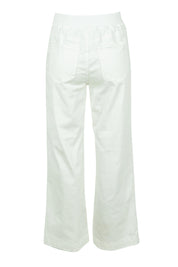 Product shot of the Carpenter Wide Leg Jean in colour Ivory, from the back