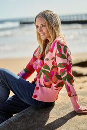 Model Maggie wearing size S of the Bloom Cardigan in colour Pinkmulti (Pink), from the front, showing the whole outfit