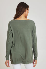Model Madeline wearing size S of the Saint Barth Knit in colour Khaki (Green), from the back