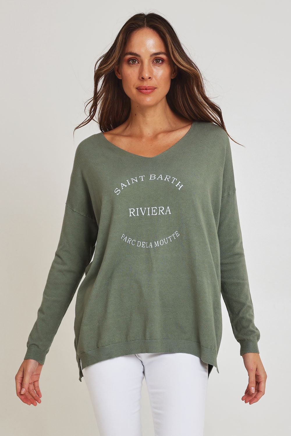 Model Madeline wearing size S of the Saint Barth Knit in colour Khaki (Green), from the front, cropped image
