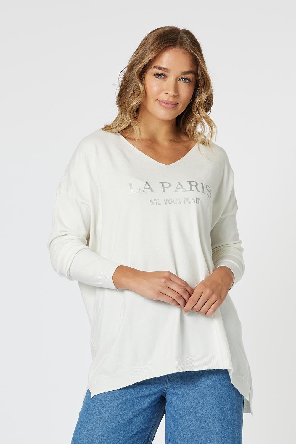A model wearing the La Paris Knit Jumper in colour White (White), from the front, cropped image