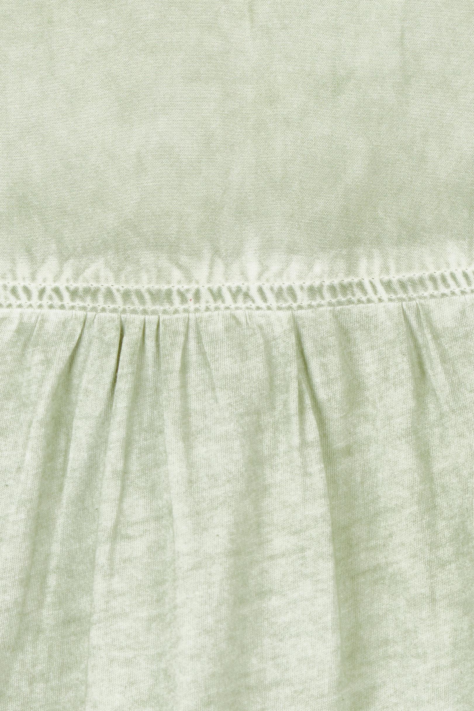 Product shot of the Paige Garment Washed Shirt in colour Washgreen (Green), detail