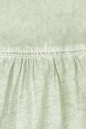Product shot of the Paige Garment Washed Shirt in colour Washgreen (Green), detail
