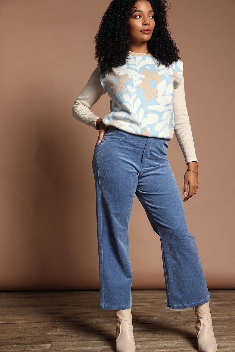 Model Ziara wearing size S of the Lucy Stretch Cord Pant in colour Blue (Blue), from the front, showing the whole outfit