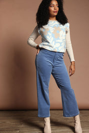 Model Ziara wearing size S of the Lucy Stretch Cord Pant in colour Blue (Blue), from the front, showing the whole outfit
