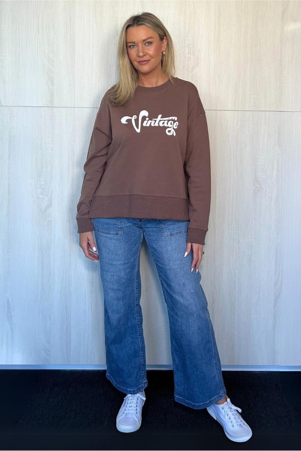 A model wearing the Vintage Cotton Blend Sweatshirt in colour Chocolate, from the front, showing the whole outfit