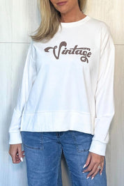 A model wearing the Vintage Cotton Blend Sweatshirt in colour White (White), from the front, cropped image