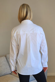 A model wearing the City Rib Cuff Cotton Blend Shirt in colour White (White), from the back