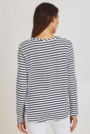 Model Madeline wearing size S of the Riviera Cotton Blend Tee in colour Navywhite (Blue), from the back