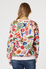A model wearing the Rio Top in colour Multi (Pink), from the back