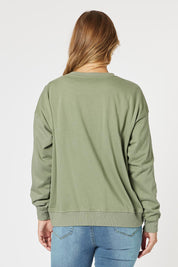 A model wearing the Voila Cotton Blend Sweat in colour Khaki (Green), from the back