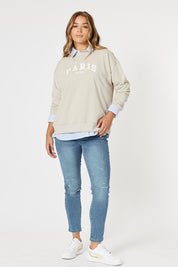 A model wearing the Paris Cotton Blend Sweat in colour Stone, from the front, showing the whole outfit