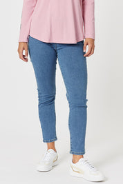 A model wearing the Chicago Jean in colour Denim (Blue), from the front, cropped image