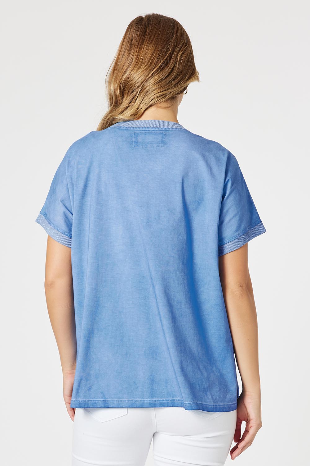 A model wearing The Sienna Linen Blend Tee in colour Blue (Blue), from the back