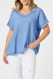 A model wearing The Sienna Linen Blend Tee in colour Blue (Blue), from the front, cropped image