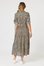 A model wearing the Le Marais Cotton Dress in colour Animal, from the back