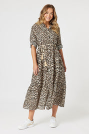 A model wearing the Le Marais Cotton Dress in colour Animal, from the front, showing the whole outfit