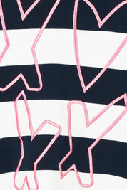Product shot of the Love & Kisses Cotton Dress in colour Navypink (Blue), detail