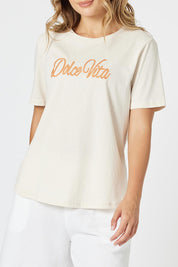 A model wearing the Dolce Vita Cotton Blend Tee in colour Natural, from the front, cropped image