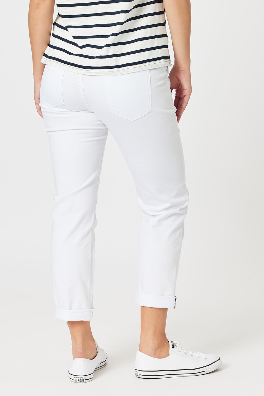 A model wearing the Isabella Cotton Pant in colour White (White), from the back