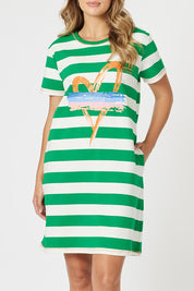 A model wearing the Heart Stripe Cotton Dress in colour Elmwhite (Green), from the front, cropped image
