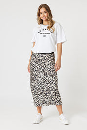 A model wearing the Le Marais Cotton Tee in colour White (White), from the front, showing the whole outfit