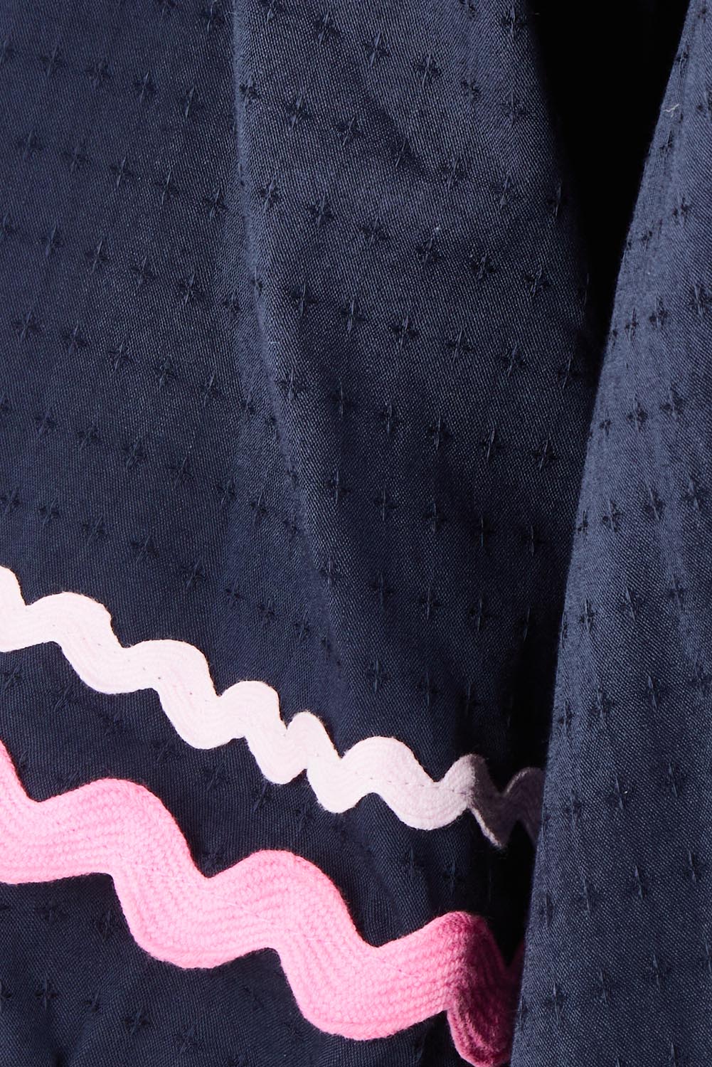 Product shot of the Ric Rac Cotton Top in colour Navy (Blue), detail