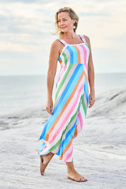 Model Bianca wearing size S of the Lucy Stripe Sundress in colour Stripe, from the front, showing the whole outfit