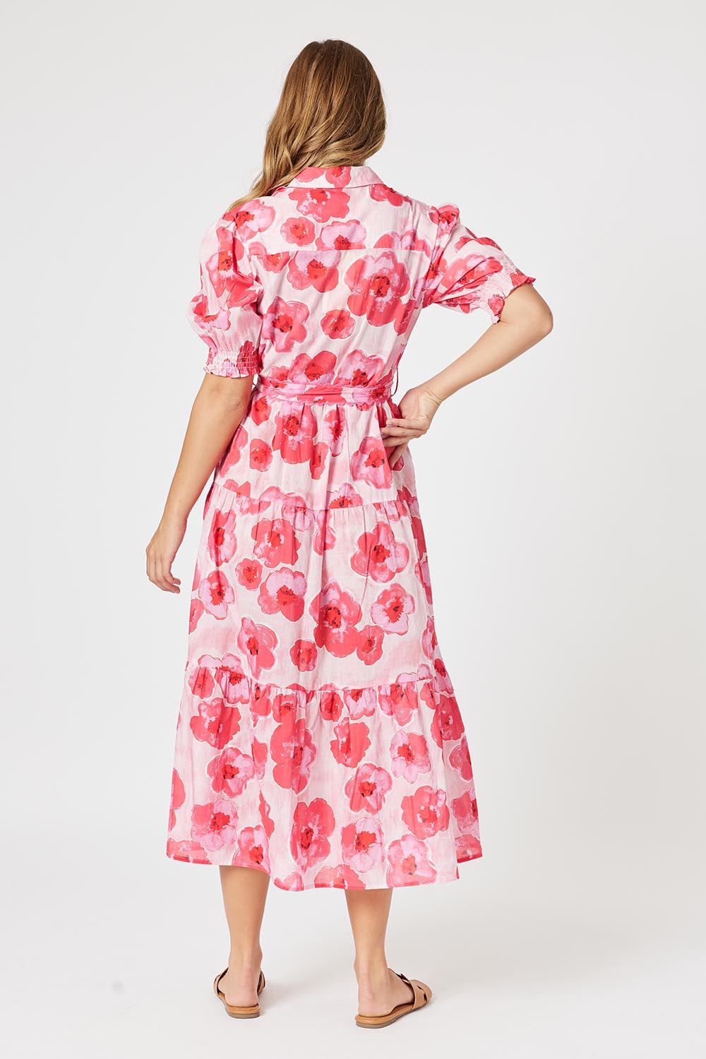 A model wearing the Pink Poppies Cotton Dress in colour Pink (Pink), from the back