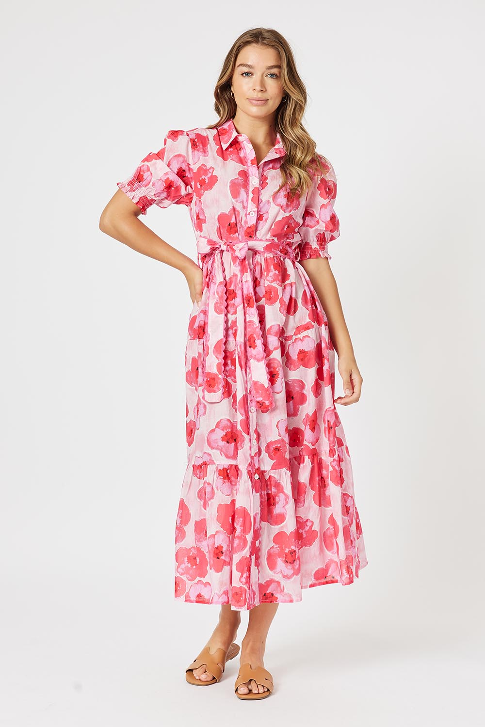 A model wearing the Pink Poppies Cotton Dress in colour Pink (Pink), from the front, showing the whole outfit