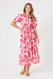 A model wearing the Pink Poppies Cotton Dress in colour Pink (Pink), from the front, showing the whole outfit