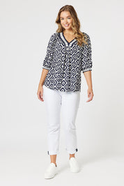 A model wearing the Diamonds Are Forever Top in colour Navy (Blue), from the front, showing the whole outfit