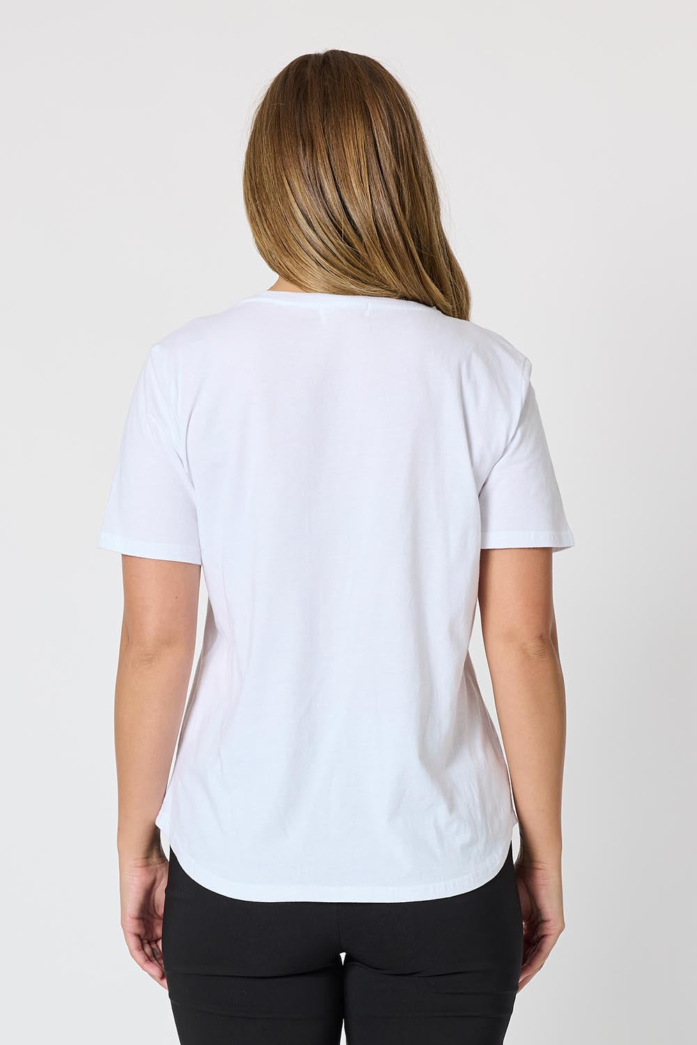 A model wearing the Martini Cotton Tee in colour White (White), from the back