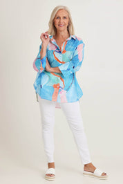 Model Sandy wearing size S of the Grazia Mio Caro Cotton Shirt in colour Blue (Blue), from the front, showing the whole outfit