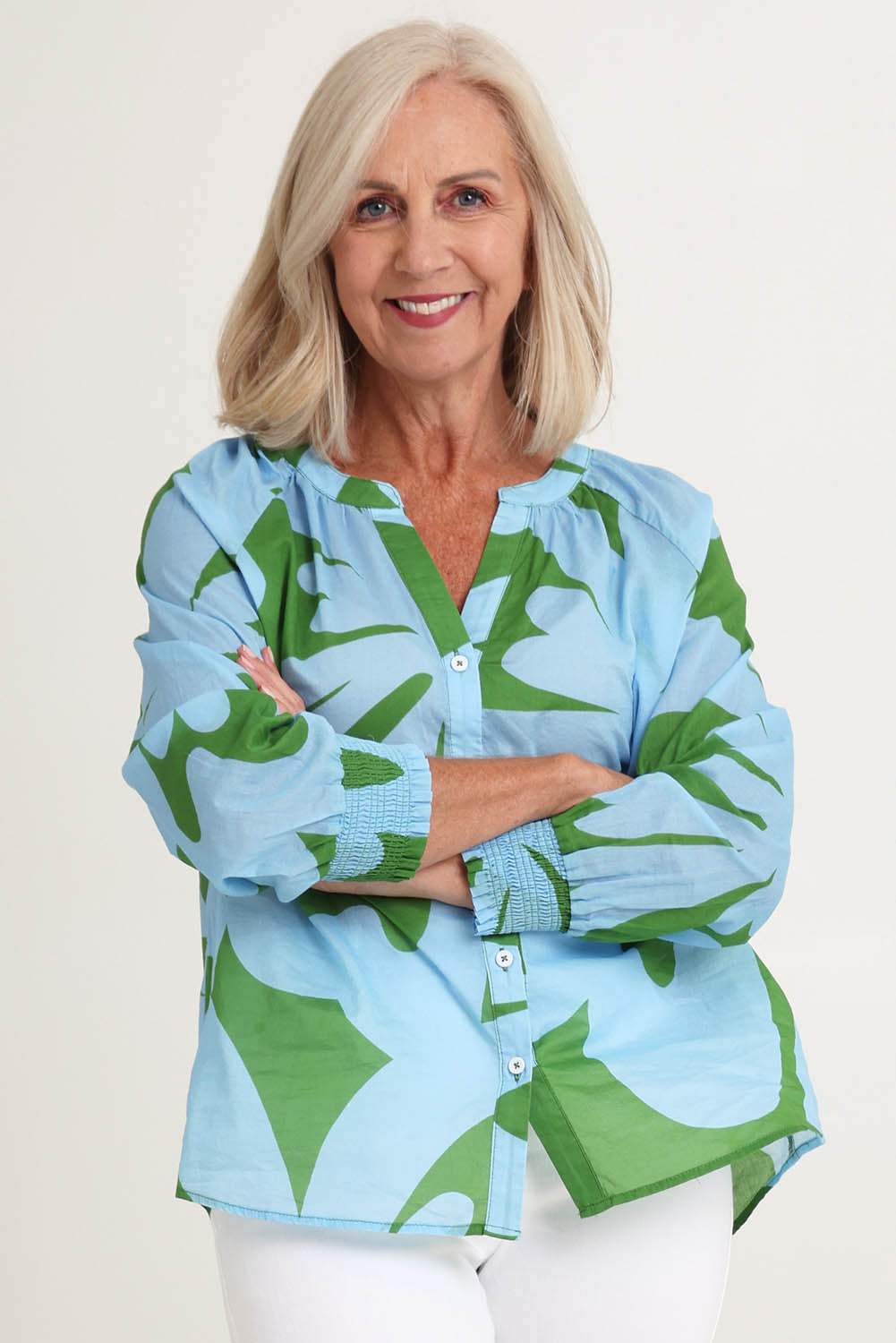 Model Sandy wearing size S of the Sienna Cotton Top in colour Blue (Blue), from the front, cropped image