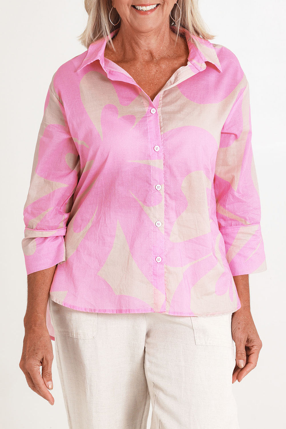Model Sandy wearing size S of the Sienna Cotton Shirt in colour Pinkstone (Pink), from the front, cropped image
