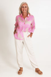 Model Sandy wearing size S of the Sienna Cotton Shirt in colour Pinkstone (Pink), from the front, showing the whole outfit