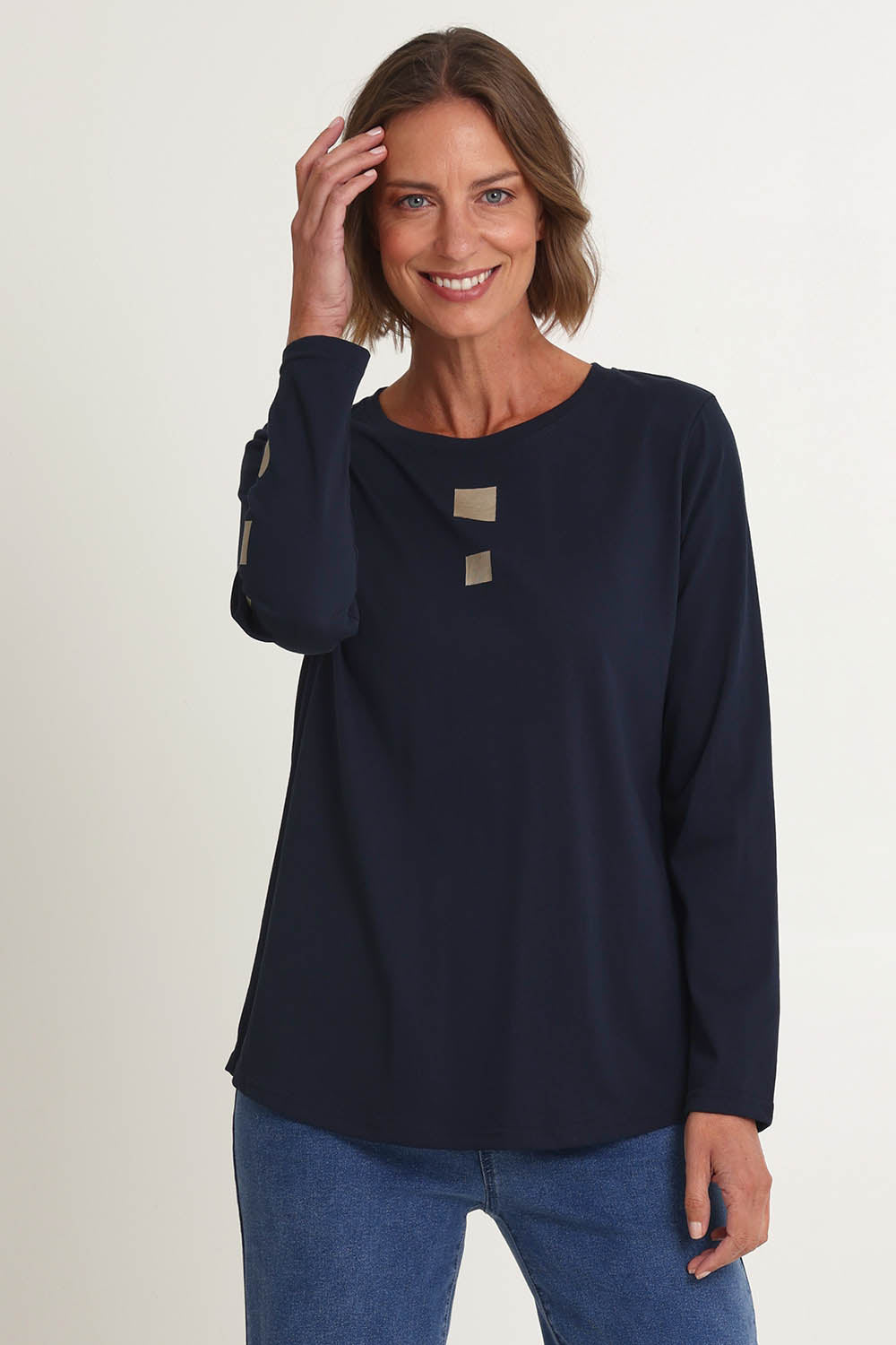 Model Riina wearing size S of the Heart Square Tee in colour Navy (Blue), from the front, cropped image