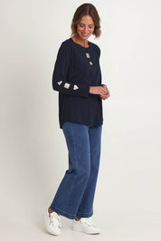 Model Riina wearing size S of the Heart Square Tee in colour Navy (Blue), from the front, showing the whole outfit