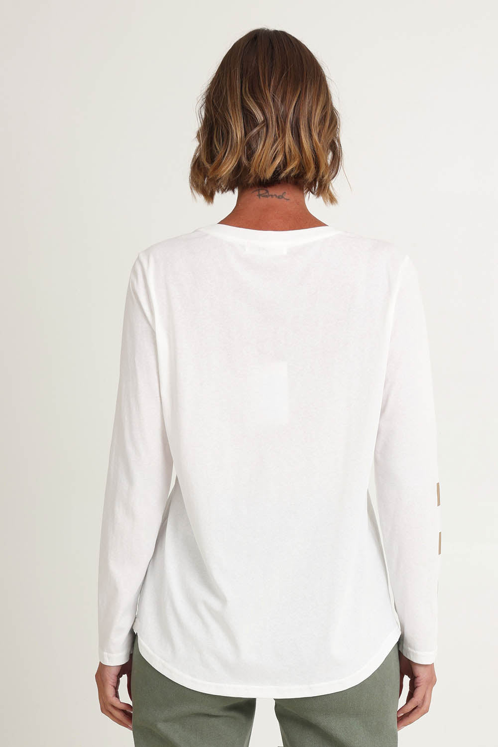 Model Riina wearing size S of the Heart Square Tee in colour White (White), from the back