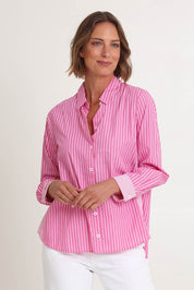 Model Riina wearing size S of the Cabo Stripe Shirt in colour Pink (Pink), from the front, cropped image